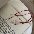 Minimalist S925 silver red rope bracelet with hammered texture OT buckle on white plate - 16cm