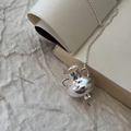Vintage 925 sterling silver amphora necklace displayed on an open book for a retro look - 925 Silver / Silver (XL104)