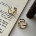 Minimalist S925 sterling silver double layer knot rings in gold finish on vintage book - Gold