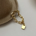 Minimalist gold chain ring with small rectangular lock pendant on a textured display - 14# / Gold