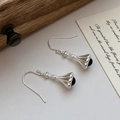 S925 sterling silver drop earrings with matte texture and black agate beads shown on desk - 925 Silver / EH049