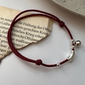 Handmade S925 sterling silver red string bracelet with Smile charm and bell on book background - Smile Engraved Bead Bell Style (18SL44) / 925 Silver