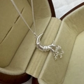 S925 sterling silver moon and star pendant necklace on beige velvet jewelry box - Star Moon Tassel Style (XLV113)