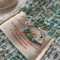 Bohemian beaded ring with turquoise and silver accents on a minimalist canvas bag background - Multi-color Beaded Style (45JZ42)