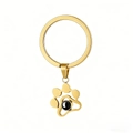 Detail of gold metal cat paw keychain with black projection bead and mirror finish - Gold
