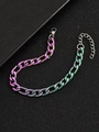 Detailed macro of rainbow gradient titanium steel curb chain with adjustable lobster clasp - Iridescent