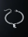 Polished silver Cuban link bracelet with Gothic letter E pendant on black reflective background - Letter I