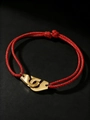 Red woven cord bracelet with interlocking gold handcuff style clasp charm for unisex wear - Red Rope Gold Metal