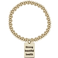 Detailed shot of gold stainless steel beaded bracelet with engraved rectangular charm - Gold (Strong beautiful health)