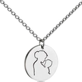 Macro shot of silver-tone circular pendant with mother and child silhouette engraving - Mother