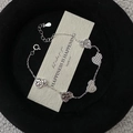 Bracciale minimalista in argento sterling S925 con cinque ciondoli a cuore e texture - Argento 925 / Stile a Forma di Zucca (SL329)