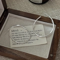 Minimalist S925 sterling silver wavy hoop earrings on a vintage wooden jewelry box - Irregular Wavy Hoop Style (EHJ084) / 925 Silver