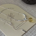 S925 sterling silver necklace with twist knot design and yellow crystal bead on a card - 925 Silver / Silver Knot with Yellow Bead Style (XLT178)