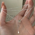 Minimalist S925 sterling silver triangle necklace with cube pendant held by hand - Minimalist Square Style (22TL33) / 925 Silver
