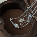 S925 sterling silver waterdrop pendant necklace displayed in a premium wooden jewelry box - 925 Silver / Silver Striped Water Drop Style (XLU132)