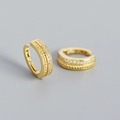 Orecchini a cerchio intrecciati dorati in stile vintage con pavé di zirconi - Oro