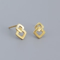 Minimalistische gouden geometrische oorknopjes met geneste ruitvormige ontwerpen - 925 zilver / Goud