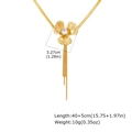 Detailed size view of gold flower necklace with zircon petals and tassel chain links - Gold