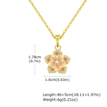 Gold rotating flower necklace with pink zircon petals and size measurement details - Pink Style (PNC-032GPK)