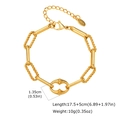 Detailed view of golden link chain bracelet with twisted ovals and K18 hallmark tag - Interlocking Rings Style (BR-2624G)