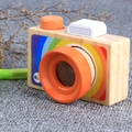 Wooden toy camera kaleidoscope with rainbow sticker and orange prism lens for kids - Handheld Style