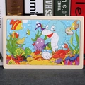 Educational ocean animal wooden puzzle for toddlers featuring colorful marine life patterns - Undersea World