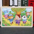 Wooden puzzle for kids featuring forest animals like pandas, bears, and monkeys - Five Little Friends