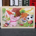 Educational wooden puzzle for toddlers featuring colorful cartoon bear and panda motifs - Three Naughty Bears