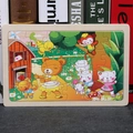 Educational wooden puzzle for kids featuring colorful farm animals like bears and cats - Animals Hide and Seek