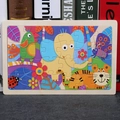 Educational wooden jigsaw puzzle for children featuring colorful forest animal illustrations - Paper-cut Elephant