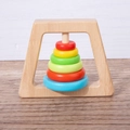 Rainbow wooden stacking rings baby toy with six colorful rings on a natural wood stand - Trapezoid Colorful Ring Tower