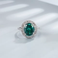Luxurious 925 silver ring featuring a large oval green gemstone with double halo diamonds - US Size 6 / Emerald Green High Carbon Diamond