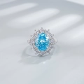 Anillo de plata 925 con zafiro azul 10x12mm y un halo de diamantes brillantes - Talla US 6 / Azul Mar