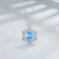 Collana in argento sterling con pendente in zaffiro azzurro e design a fiocco di neve - Argento 925 / Blu Mare