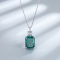 Detailed macro shot of S925 silver necklace with emerald cut zircon stone pendant - 925 Silver / Emerald