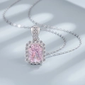 Macro view of S925 silver necklace pendant with pink Asscher cut stone and diamond halo - 925 Silver / Cherry Blossom Pink
