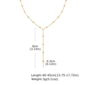 Dettaglio collana a Y dorata con pendente di 8cm e perline da 0,3cm di diametro - Oro