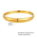 Detail showing 0.96cm width and 16.8cm circumference of the gold stainless steel bangle - Gold