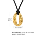 Detail of oval gold pendant with fish scale texture and adjustable black cord necklace - Gold