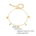 Detailed view of 18K gold butterfly and zircon charms on a delicate flat cross chain - Butterfly Bow Rhinestone Style (BR-2511G01-1)