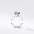 Sparkling S925 sterling silver ring featuring a large round zircon and halo setting - US Size 5 / Silver