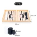 Small wooden fast sling puck game board with 10 black and white playing pieces - Small Sling Puck