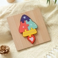 Puzzle a razzo in legno per bambini con blocchi geometrici colorati su base naturale - Razzo