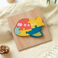 Wooden cartoon airplane 3D puzzle toy in red yellow and blue for early education - Airplane
