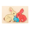 Educational wooden rabbit puzzle featuring three sizes in cream, red, and blue colors - Rabbit Style