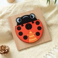 3D wooden ladybug puzzle for kids early education with red and black spotted pieces - Ladybug