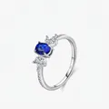 Elegant S925 sterling silver ring with oval blue gemstone and marquise accents - US Size 5 / Silver