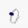 Elegant S925 sterling silver ring with oval blue sapphire and sparkling side diamonds - US Size 5 / Silver