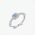 Elegant S925 sterling silver ring with square blue gemstone and cubic zirconia halo - US Size 5 / Silver