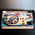 Wooden Montessori steering wheel busy board toy with gear shifter and sensory controls - Driving Simulator Steering Wheel (P0.7)